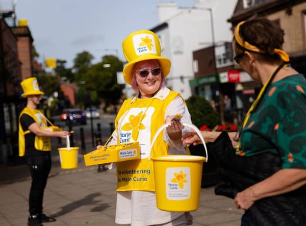 Volunteers raise funds for The Great Daffodil Appeal.