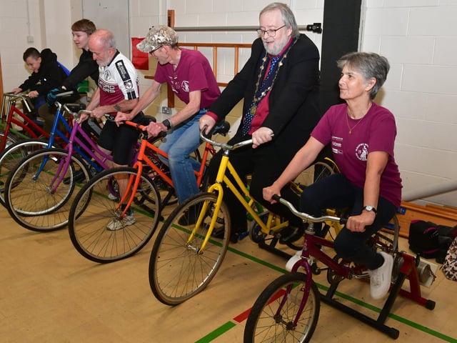 Pedal powered cinema in Church Lane School's eco-village. L-R Joshua Hall, Connor Garland, Chris Close, Ian Paul, Cllr David Suiter, Julie Close