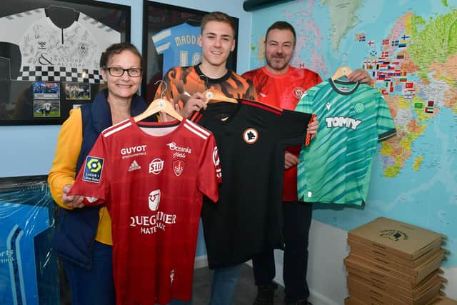 Louis Jones 19, of Surprise Shirts with his parents Rob and Kellie Jones. Photos: D.R.Dawson Photography