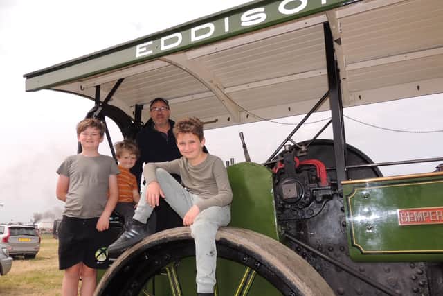 Ian Smith of Donington on board his Aveling and Porter steam roller with Dave, Stan and Adam Granby, also of Donington.