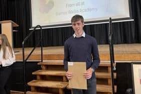 George Baker collecting his results.