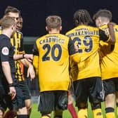 United celebrate a late point. Pic: Russell Dossett.