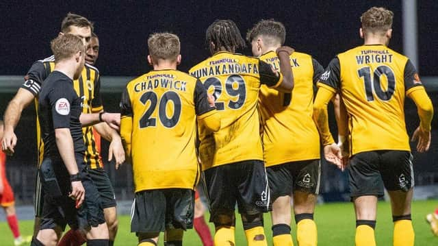 United celebrate a late point. Pic: Russell Dossett.