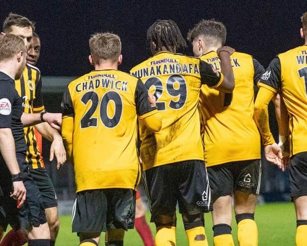 United celebrate a late point. Pic: Russell Dossett.