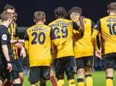 United celebrate a late point. Pic: Russell Dossett.