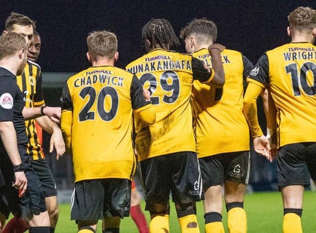 United celebrate a late point. Pic: Russell Dossett.