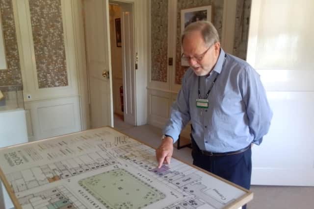 A Gunby volunteer in the new pioneer rooms of the house.