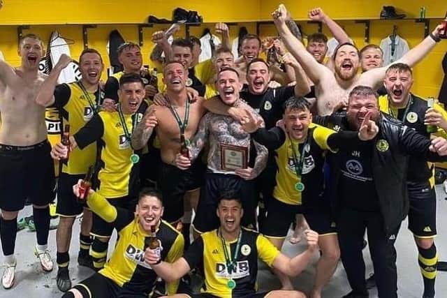 Wyberton celebrate their county cup win.