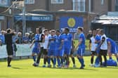 Gainsborough players surround the referee following a bad tackle in Saturday's FA Cup tie. Photo by Mike Sheridan.