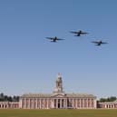 The flight of three retiring Hercules pass over RAF College Cranwell.