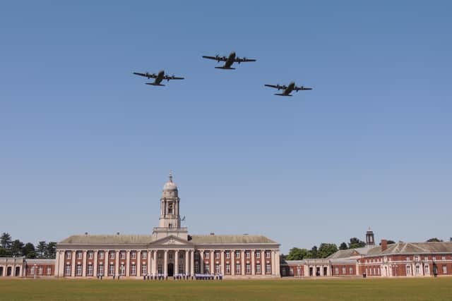 The flight of three retiring Hercules pass over RAF College Cranwell.