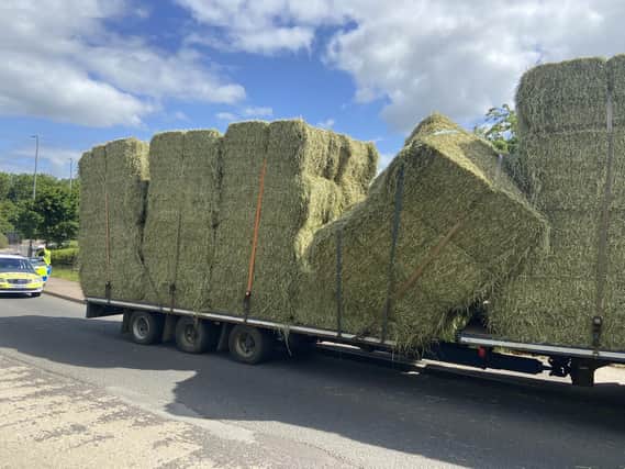 Police captured this image of hay bales dangerously hanging off a trailer as it approached the A1 in the west of the county.