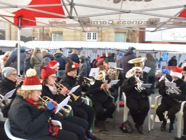Skegness Silver Band playing at the Christmas market in Lumley Avenue.