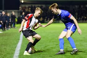 Will Lancaster, who scored a 94th minute equaliser, keeps an eye on Jack Bearne. Pic: Dave Thawley.