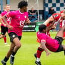 High-flying action from Trinity's clash with Sheffield United.