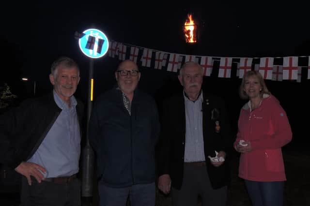 Villagers celebrating the jubilee lighting in Kirkby la Thorpe.