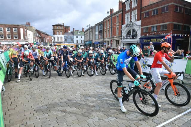 Riders get into position for the start of the race.