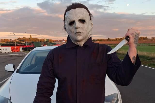 John Stephenson dressed as Halloween villain Michael Myers. Photo: Jane Pumphrey / SWNS