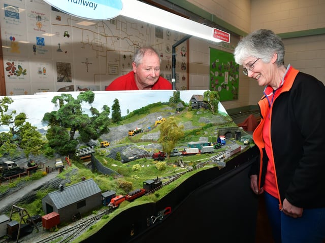 Model rail enthusiast Chris Richardson of Swaton with visitor, Sarah Burton of Boston.
