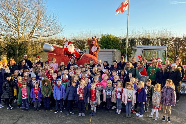 Santa visits pupils and staff at  North Cockerington School.