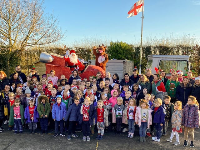 Santa visits pupils and staff at  North Cockerington School.