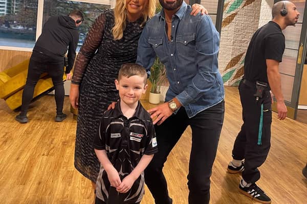 Lucas with This Morning hosts Rylan Clark and Josie Gibson.