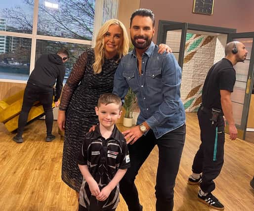 Lucas with This Morning hosts Rylan Clark and Josie Gibson.