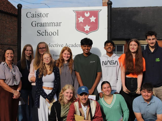 Proud Year 11 students with Shona Buck, headteacher at Caistor Grammar School.