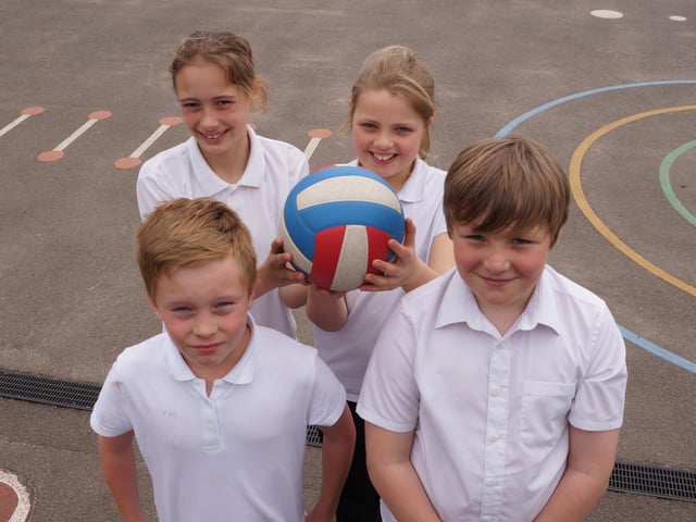 Osgodby Primary School's volleyball team - Jake Christie, Libby-Jo Shipham, Eleanor Moore and Wilf Marris - pose for the camera after taking part in an area tournament at Cherry Willingham.