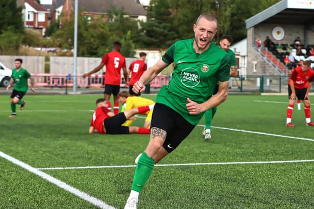 Ryan Rushen turns away after scoring Sleaford's goal. Photo: Steve W Davies Photography.