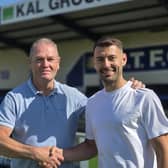 Trinity boss Russ Wilcox welcomes new signing Jonny Margetts.
