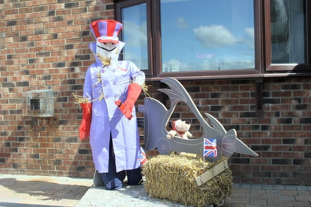 Dick Dastardly and Mutley from the Wacky Races inspired this scarecrow duo.