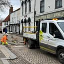Coun William Gray, who represents Horncastle, with the county council highways team at work in the town centre. (PHOTO BY: Lincolnshire County Council)