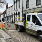 Coun William Gray, who represents Horncastle, with the county council highways team at work in the town centre. (PHOTO BY: Lincolnshire County Council)