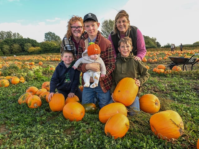 Pictured (from left) Benji Brook, nine, Emma Brook, Samuel Brook, 12, with five-month-old JJ Brown, Bev Johnson, and Oakley Trapmore, 12.