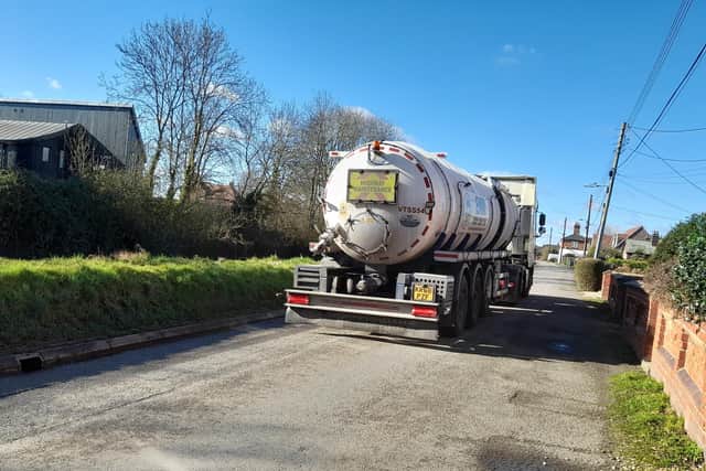 Tankers on West Bank in Saxilby, going to the sewage treatment plant