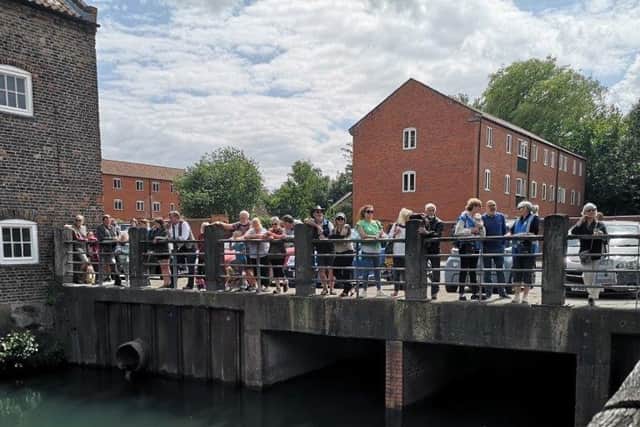 Some of the Culture on the Canal audience spread over the bridge at  the Riverhead. Image Alison Eades
