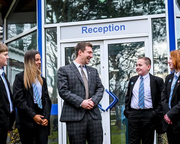 Jake Bailey, the new Principal at Somercotes Academy with students. Photo by Jon Corken