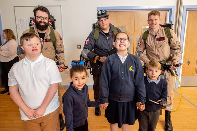 'Who ya gonna call?' - Pupils meet the Ghostbusters at the official opening of their new school in Boston.