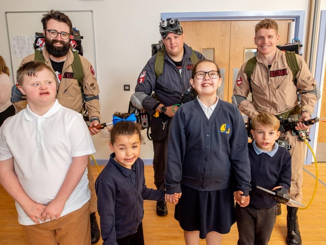 'Who ya gonna call?' - Pupils meet the Ghostbusters at the official opening of their new school in Boston.