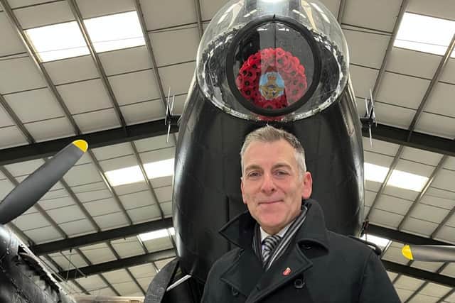 Iain Hyde with one of the rocks at the launch of the Lincolnshire Royal British Legion Poppy Appeal.
