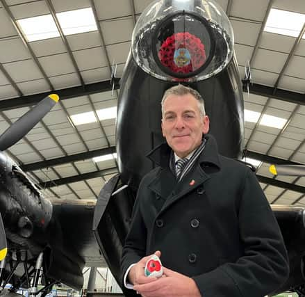 Iain Hyde with one of the rocks at the launch of the Lincolnshire Royal British Legion Poppy Appeal.