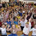 Children at Gosberton Academy give cheers for Children in Need during their assembly.
