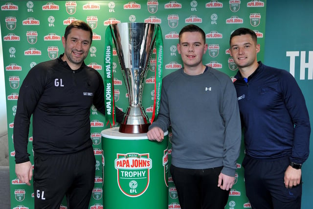 Graeme Lee (left) and Luke Molyneux along with Bailey Bates and The Papa John's Trophy.