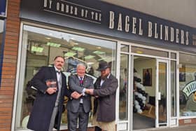 Characters based on the TV series Peaky Blinders welcome Mayor of Skegness Coun Pete Barry to the new Bagel Blinders cafe at the Hildreds Centre in Skegness.