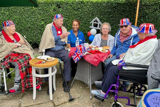 Clarendon Hall residents enjoying food with colleagues