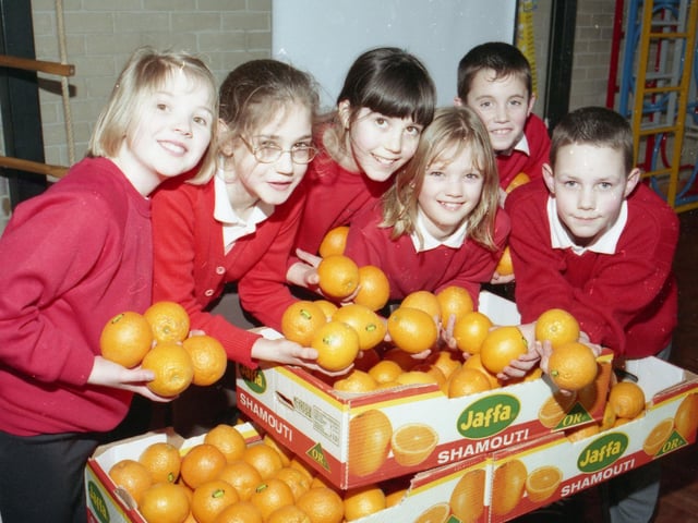 Children from Hawthorn Tree School, Boston, alongside some tasty lesson materials - oranges donated by Asda. Pictured are Sophie Hilton, Kimberley Gilchrist, Ruth Dawson, Emma Lilly, Lee Melton and Joe Harrison.