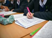 Students write in their exercise books in class at Royal High School Bath, which is a day and boarding school for girls aged 3-18 and also part of The Girls' Day School Trust, the leading network of independent girls' schools in the UK. 