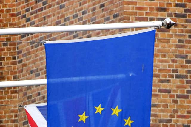 The Union Jack pictured behind the European Union flag in London.