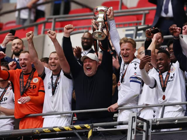 Bromley celebrate their promotion success from the National League last season.
